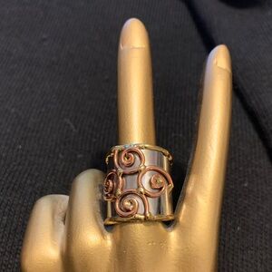 Elegant Gold and Silver Swirl Ring